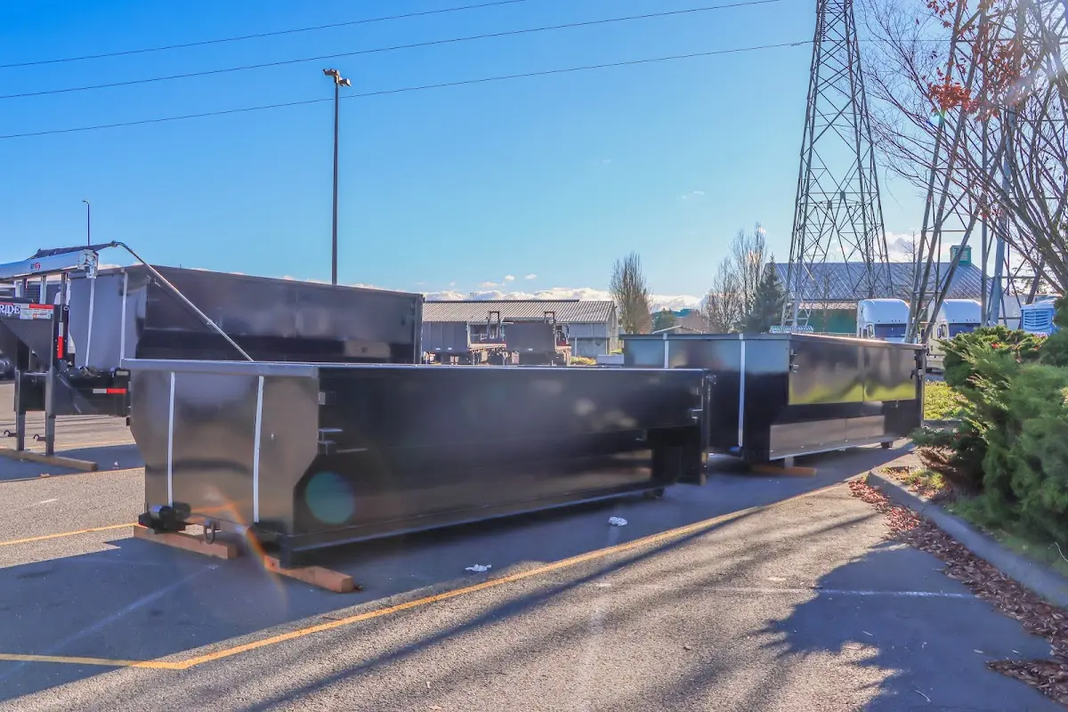 Roll-off dumpster ready for waste disposal at job site for Demolition Dumpster Rental in Lyons